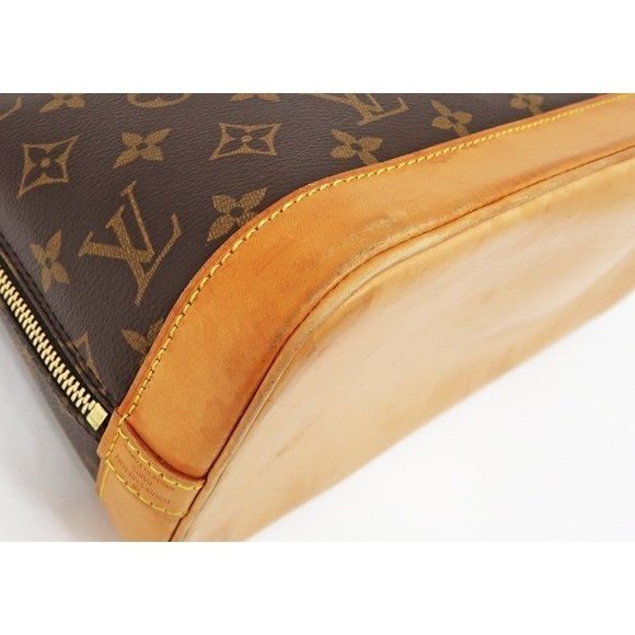 Louis Vuitton Alma Monogram Handbag - Picture 3 of 6